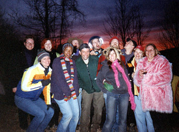 campmates gather at sunset